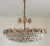 This chandelier made of gold-plated brass was produced in various sizes, this is the very large version with a diameter of...