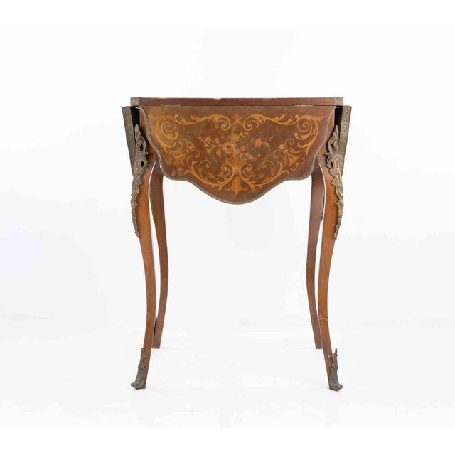 Small Folding Table realized in Italy in the early 20th Century. Good overall condition except for some minor signs of...