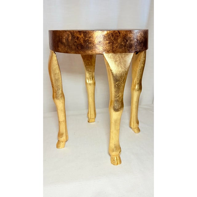 Step into a realm of elegance with this Vintage Hollywood Regency Doe Hoof Foot Table, an exquisite piece that marries...