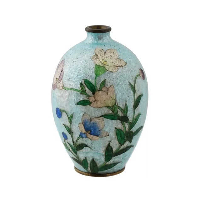 An antique Japanese, late Meiji era, Ginbari enamel over copper vase. The globular shaped vase is enameled with a...
