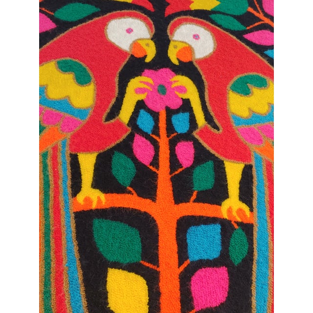 Here's a beautifully crafted hooked wool wall hanging featuring parrots made for tourist trade in the Mid 20th Century...