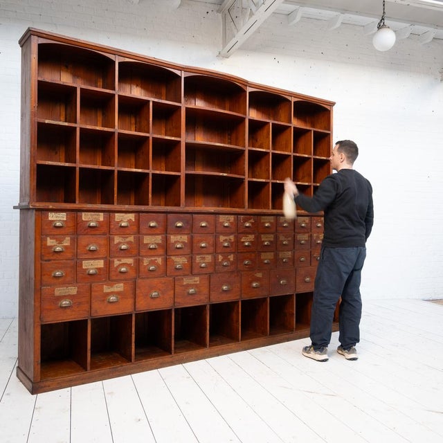 Large hardware cabinet - early 20th century 42 functional drawers Fir wood frame and top. Original patina. Brass handles...
