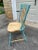 This solid maple Windsor chair features bamboo-style legs, spindles, and stretchers. It closely resembles the Windsor...
