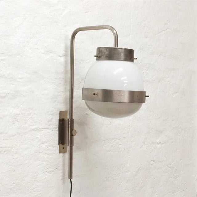 This pair of sconces was designed by Sergio Mazza for Artemide, 1960. The lights are height adjustable and swivels. I have...