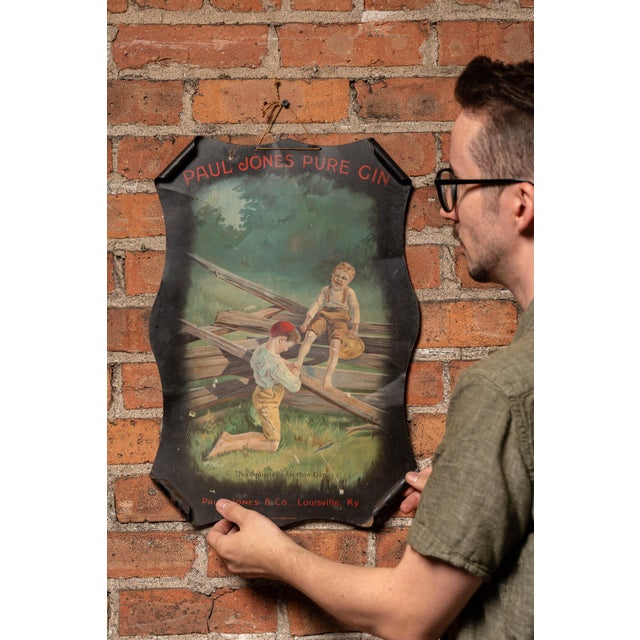 c. 1910s; mfd. by The Meek Company for Paul Jones & Co. - Louisville, KY Curved-edge self-framed tin advertising sign for...