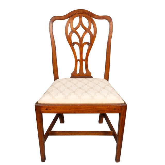 Pair Of Federal Mahogany Side Chairs with arched backs with pierced splats with small carved rosettes. Drop in seats and...