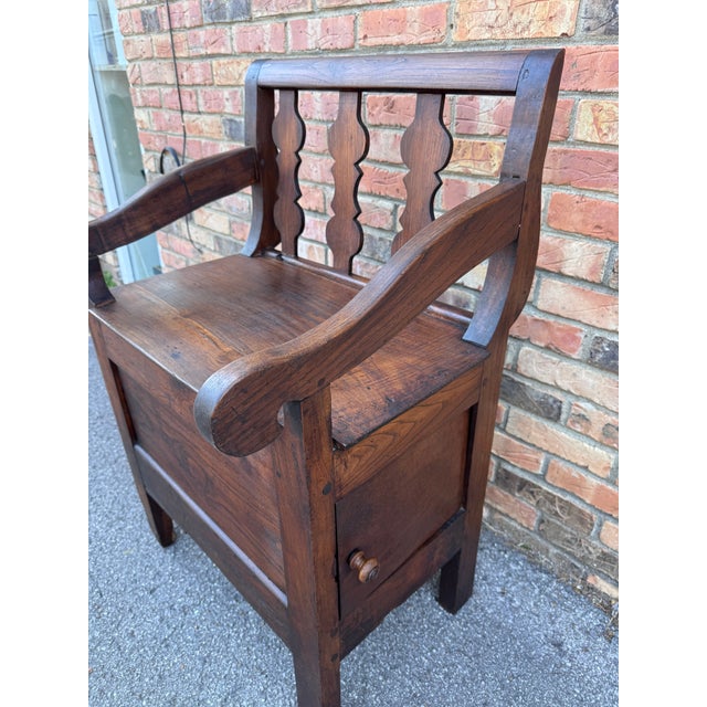 This unusual late 18th Century French Banc De Chimney/Fire Place Bench features a scrolling top rail, resting on four...