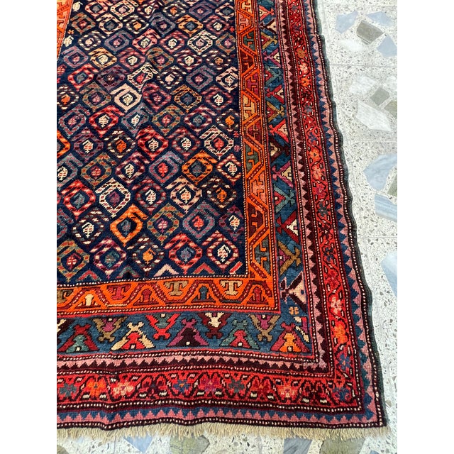 Persian Sarab design hand-knotted runner featuring an all-over diamond lattice composition filled with multicolor rosettes...