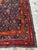 Persian Sarab design hand-knotted runner featuring an all-over diamond lattice composition filled with multicolor rosettes...