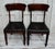 A lovely pair of regency dark oak chairs. Made from mahogany with the original oilcloth seat cover. C1830 antique oilcloth...