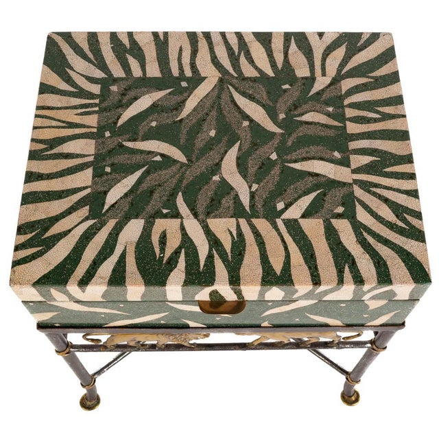 This is a handmade box-top table, produced by Maitland Smith in the Phillipines in the 1990s-2000s. The table has a black...