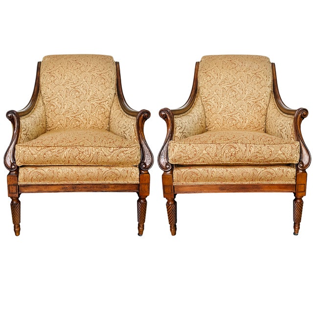 This sophisticated pair of Drexel Heritage armchairs represents the pinnacle of American furniture craftsmanship, blending...