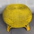 A vibrant and versatile circular floor stool ottoman, handcrafted from wicker and wicker woven on a sturdy rattan cane...