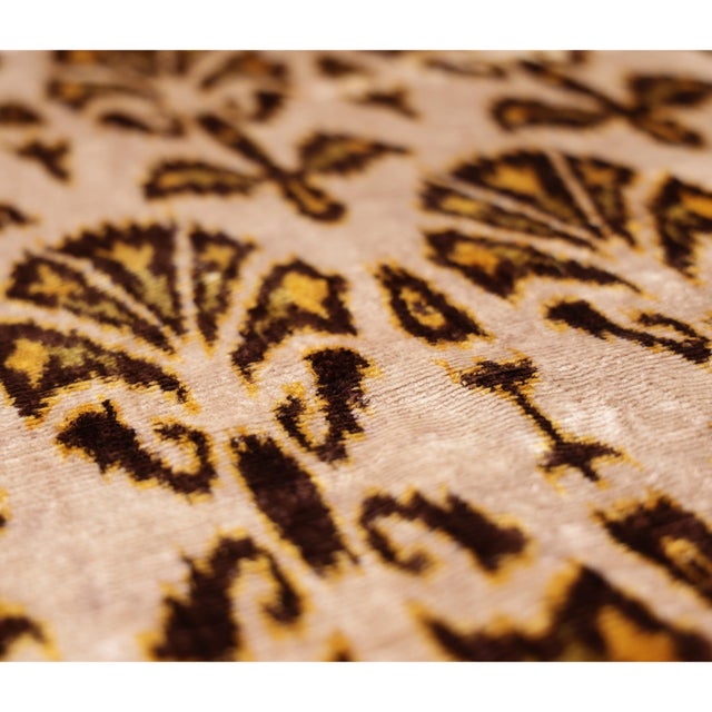 "Rich, sophisticated, and effortlessly timeless, this handmade silk velvet pillow showcases a striking Ikat-inspired motif...