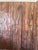 Infused with heritage and artisanal depth, this vintage brown barn door showcases intricate tribal hand-carved detailing...
