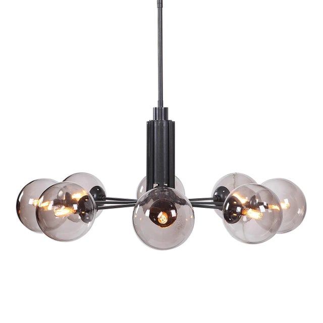 Clean sleek lines of both Industrial and a nod to Mid-Century. This 8 light pendant features a gunmetal finish with light...