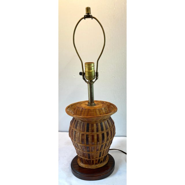 Nice vintage wicker lamp in an oval shape.