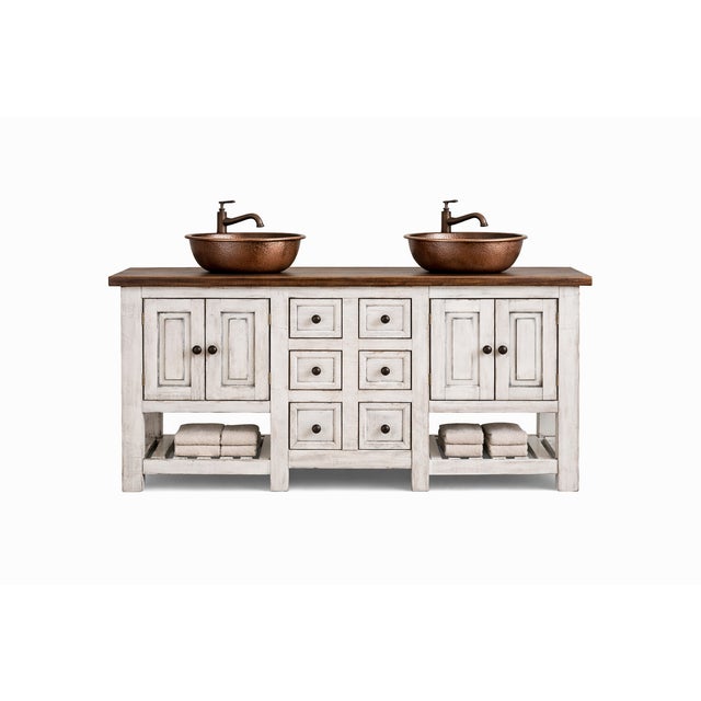 Handcrafted by highly skilled artisans in Mexico using reclaimed solid wood, this rustic farmhouse double sink vanity...