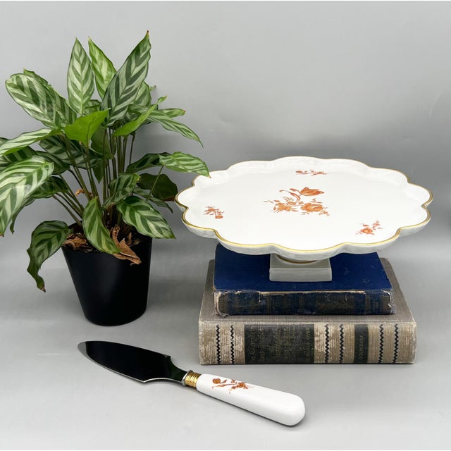 Stunning vintage Limoges porcelain pedestal cake stand with matching serving knife, beautifully finished with a graceful...