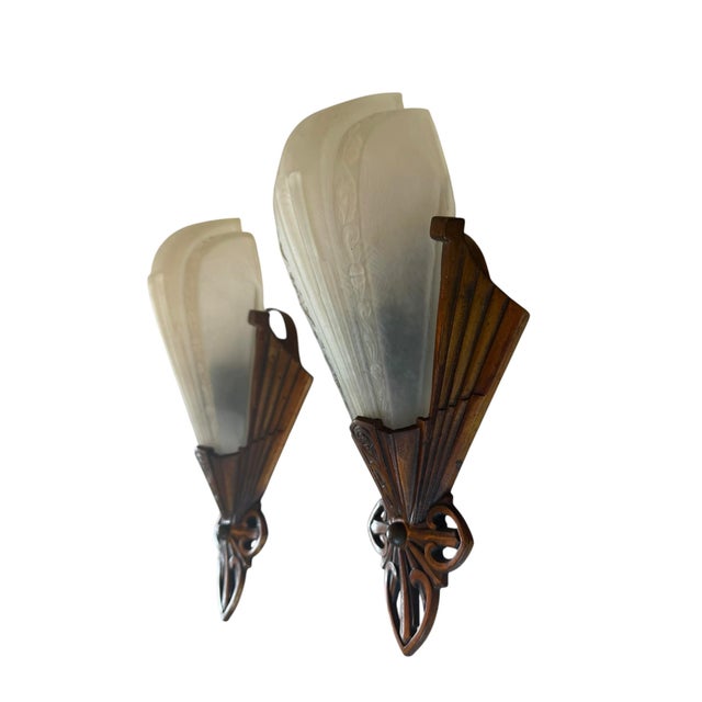 Original John C. Verdin art deco wall sconces are classic and will add architectural style to any home. This pair features...
