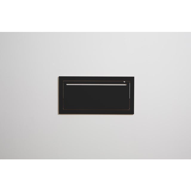 A combined shelf and clothes rail. Although at first glance this would appear to be a standard fläpps shelf, on closer...