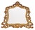 An elegant Louis XV-style mirror, made in Belgium in the 1950s, This striking piece features an ornate gilded baroque...