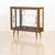 This fabulous mid century 'atomic' curio cabinet is a wonderful 1950s design and excellent storage piece. With glass...