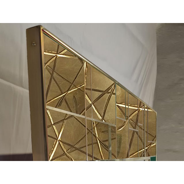 This magnificent mid-century wall mirror features a stunning combination of dark green Murano glass and intricately carved...
