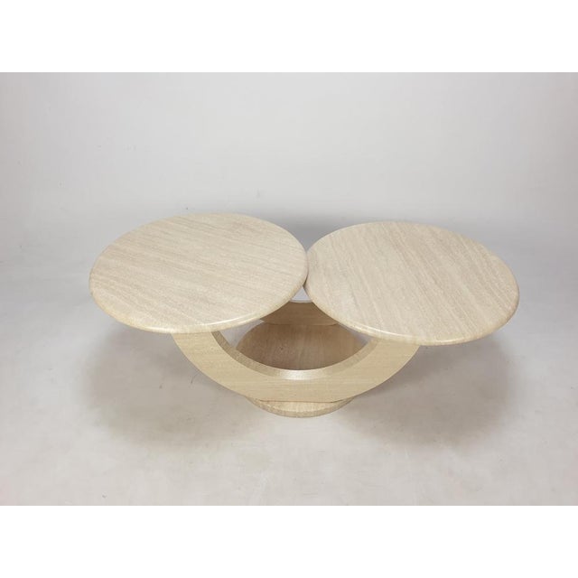 Very nice and rare Italian coffee table, fabricated in the 80s. Two round plates on a very elegant base. The plates are...