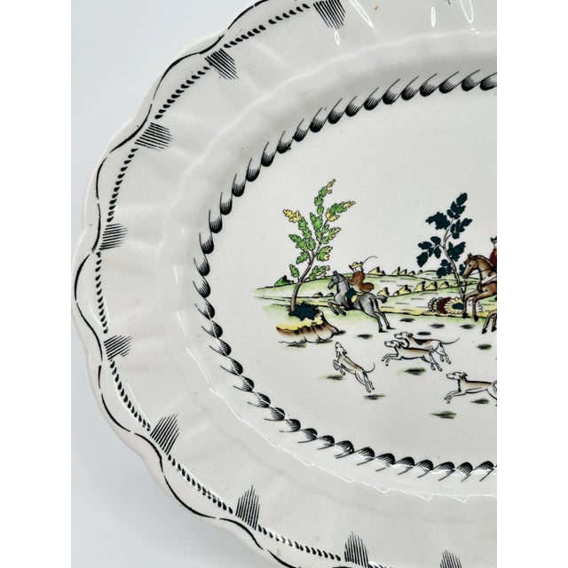 Booths Silicon China 16" scalloped edge oval serving platter in pattern Liverpool Hunt. Multicolor hunting scenes. Made in...