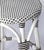 Tobias 24 in. Seat Height Round Rattan Backless Counter Stool, White/Black Dot / White Rattan Frame For Sale In Chicago - Image 6 of 8