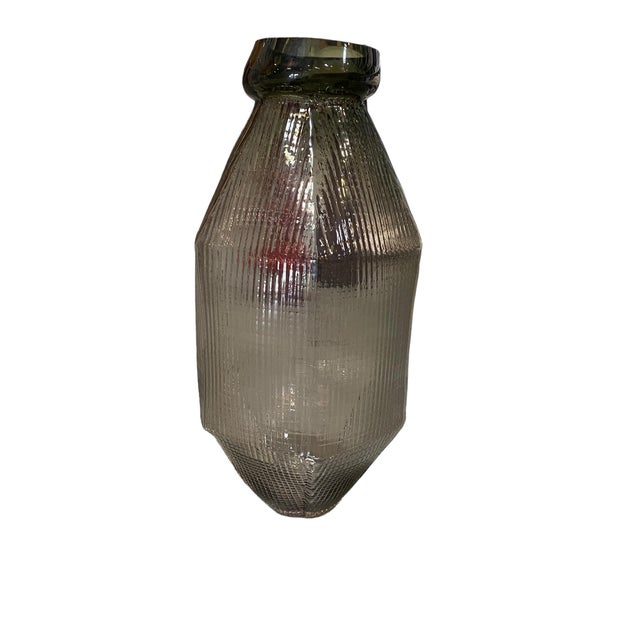 The Bronze Color Large Glass Vase could make a bold statement piece with it's shape and texture. It's height and profile...