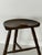 This tripod stool is Danish in origin and dates from the 1960s. The solid oak seat is carved with a saddle profile,...