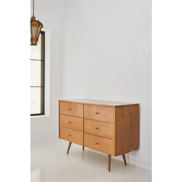 Paul McCobb for Planner Group Mid Century Modern six (6) drawer double dresser, circa 1950. Original brass knobs have the...