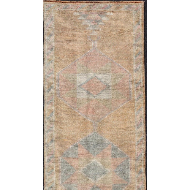 Tribal Medallion Vintage Turkish Oushak Runner in Orange, Blue and Cream For Sale - Image 9 of 11