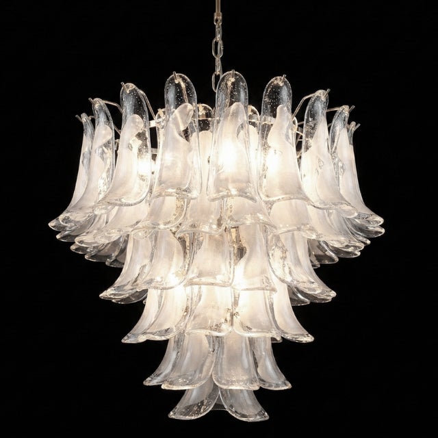 Inspired by the organic lines of Art Nouveau, this piece stands out for its stunning tiered cascade composed of multiple...