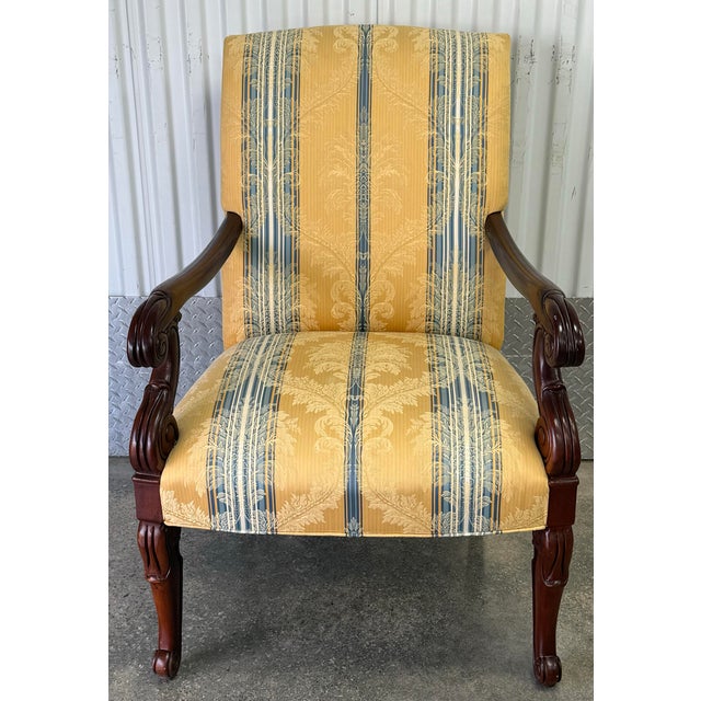 Stately “Charles X” chair by Hickory chair features a distinctive architectural design with a curved back, elegantly...