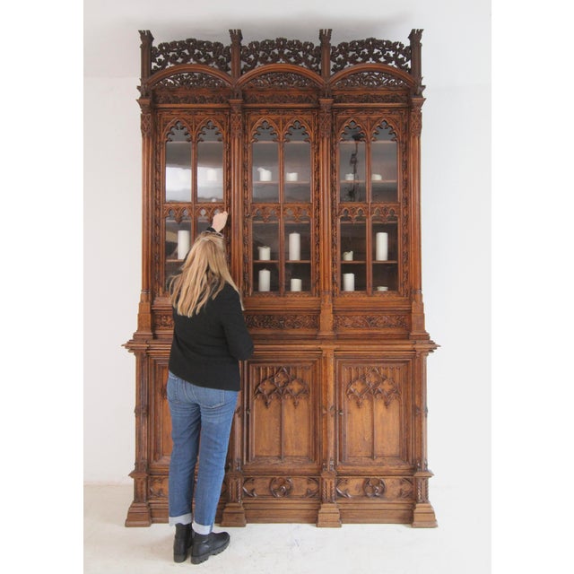 A monumental gothic revival display cabinet or bookcase from the late 19th century. Almost 3 metres high, solidly crafted...