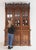 A monumental gothic revival display cabinet or bookcase from the late 19th century. Almost 3 metres high, solidly crafted...