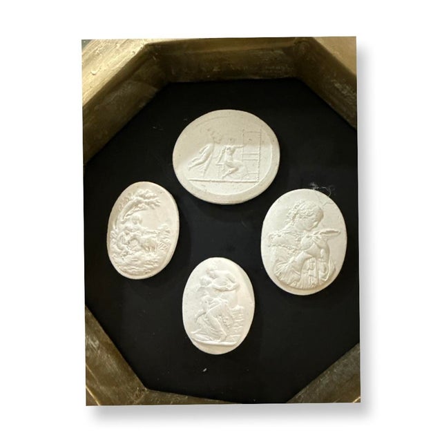 Vintage Italian souvenir of grand tour Intaglios on Wood cover in mirror frame.