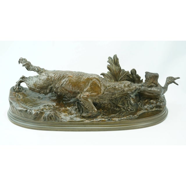 Pierre Jules Mene (1810-1879). Original cast circa 1850 Chien épagneul-griffon attrapant un canard (Spaniel-Griffon canine...