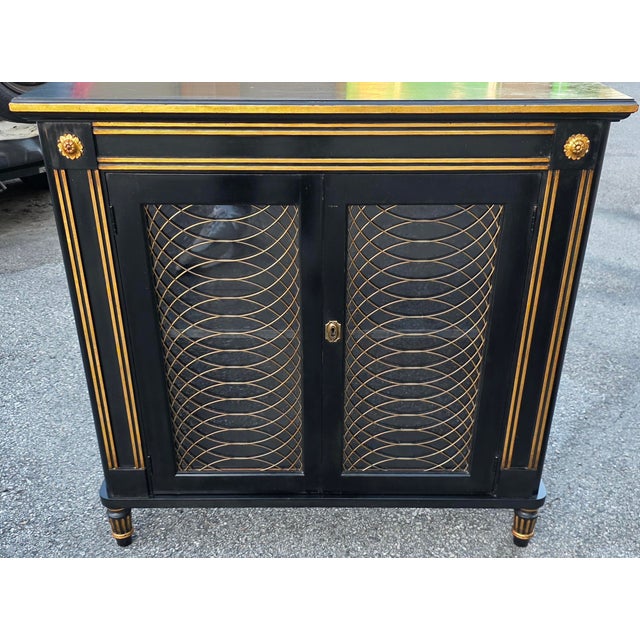 Baker Furniture Company Late 20th Century Pair of Baker Furniture Neoclassical Black Lacquer and Gilt Cabinets With Decorative Wire-Mesh Grille Doors For Sale - Image 4 of 17