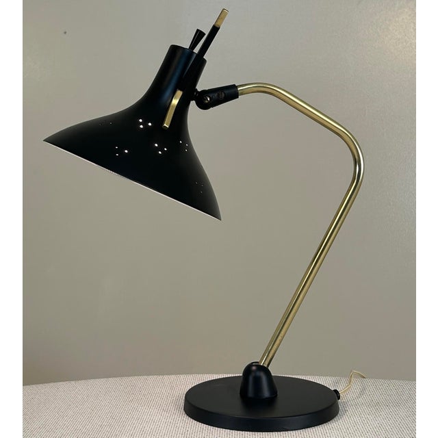 Unknown maker, with strong design elements normally seen with Maurizio Tempestini designs. Either 1960's American or...