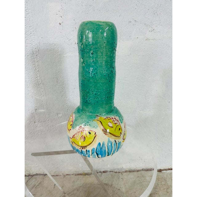 This is such a lovely piece, hand made, depicting fish. Wonderful colors and a whimsical shape.