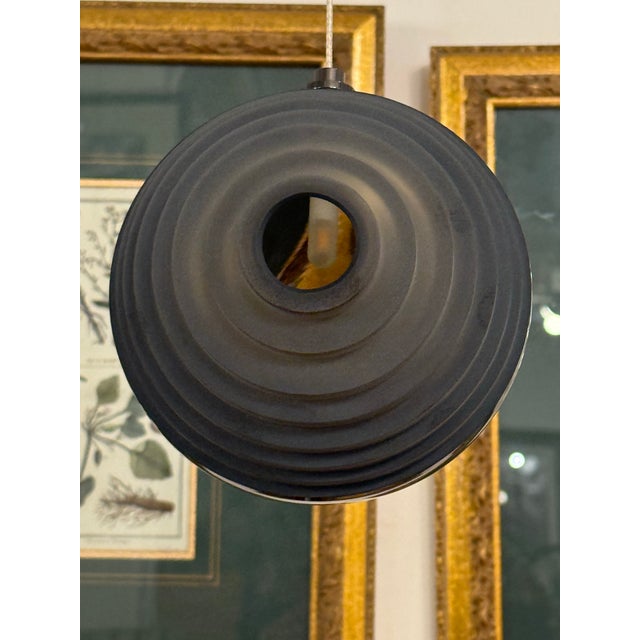 Design Plus Gallery presents a Dark & Bright Star Pendant from deChem Studio for BOMMA. This is a mouth-blown crystal...