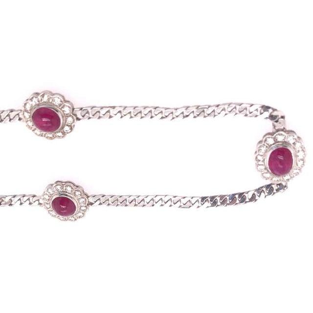 14 Karat White Gold 16 Inch Figaro Amethyst And Diamond Station Necklace 15.8 grams total weight.