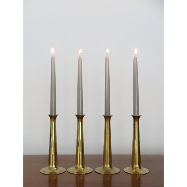 Set of four Scandinavian candle holders designed by Hans Bolling and produced by Torben Orskov in Denmark in the 1950s,...