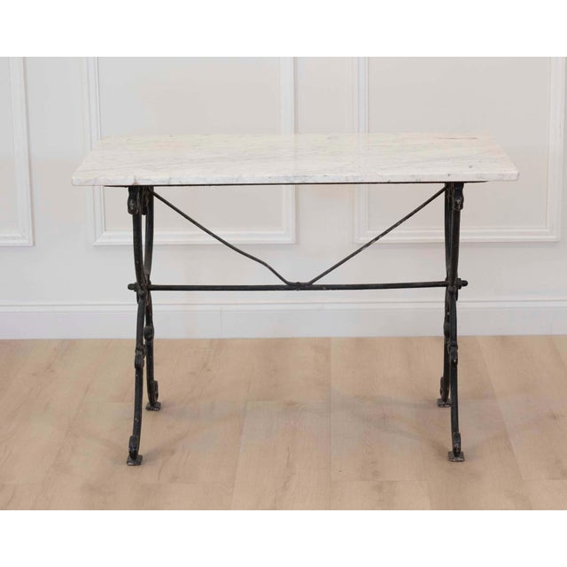Made in France around 1900, this conservatory bistro table has finely detailed ironwork. Bistro and conservatory tables of...