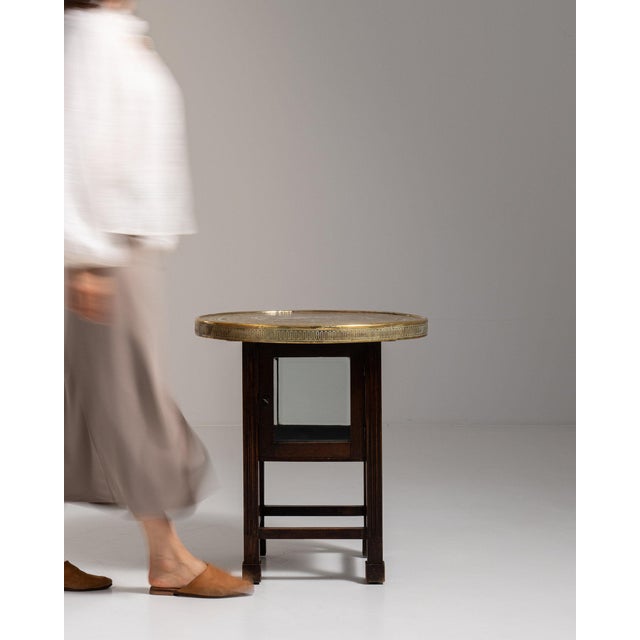 Brass and glass side table with mirrored insert in Antique Brass. Finished in antique brass, this brass and glass side...