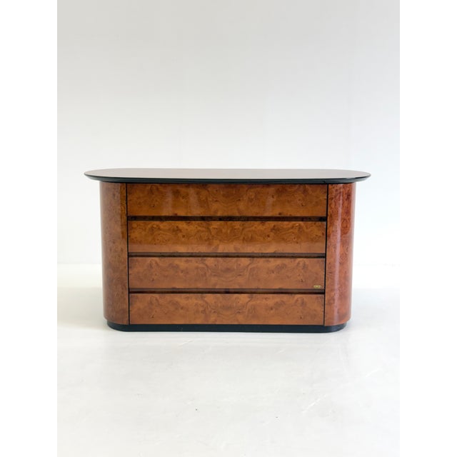 This vintage chest of drawers by Voltan is a remarkable Italian designer piece where luxurious materials and refined...